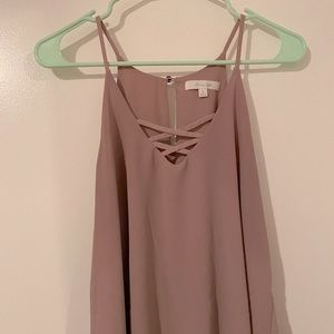 Pale pink tank top with crisscross